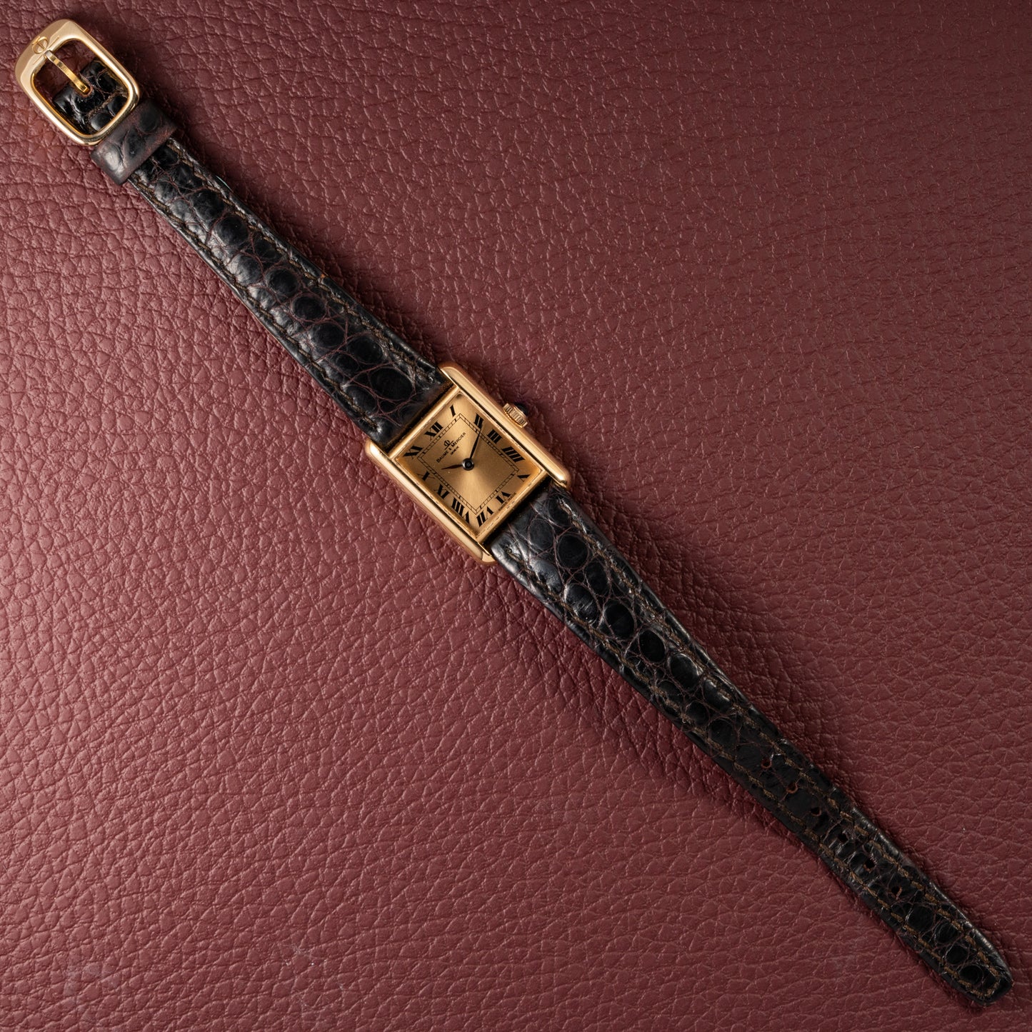 Baume & Mercier Genève Tank Black Roman Numerals 18k Yellow Gold signed by OJ Perrin Paris Ref 38302