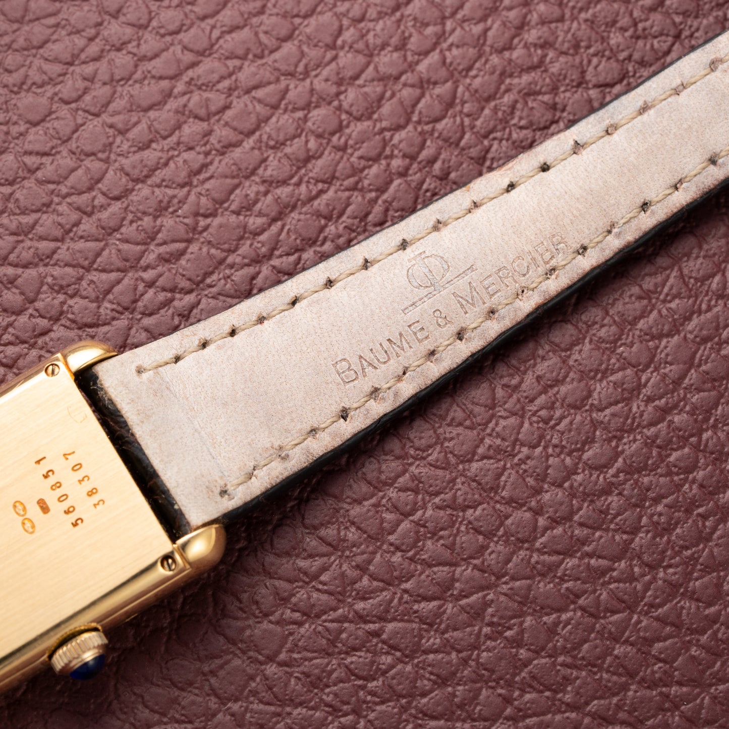 Baume & Mercier Genève Tank Black Roman Numerals 18k Yellow Gold signed by OJ Perrin Paris Ref 38302