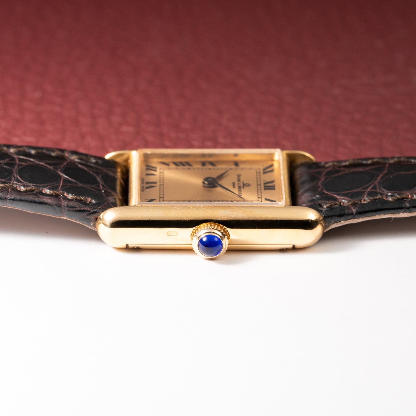 Baume & Mercier Genève Tank Black Roman Numerals 18k Yellow Gold signed by OJ Perrin Paris Ref 38302