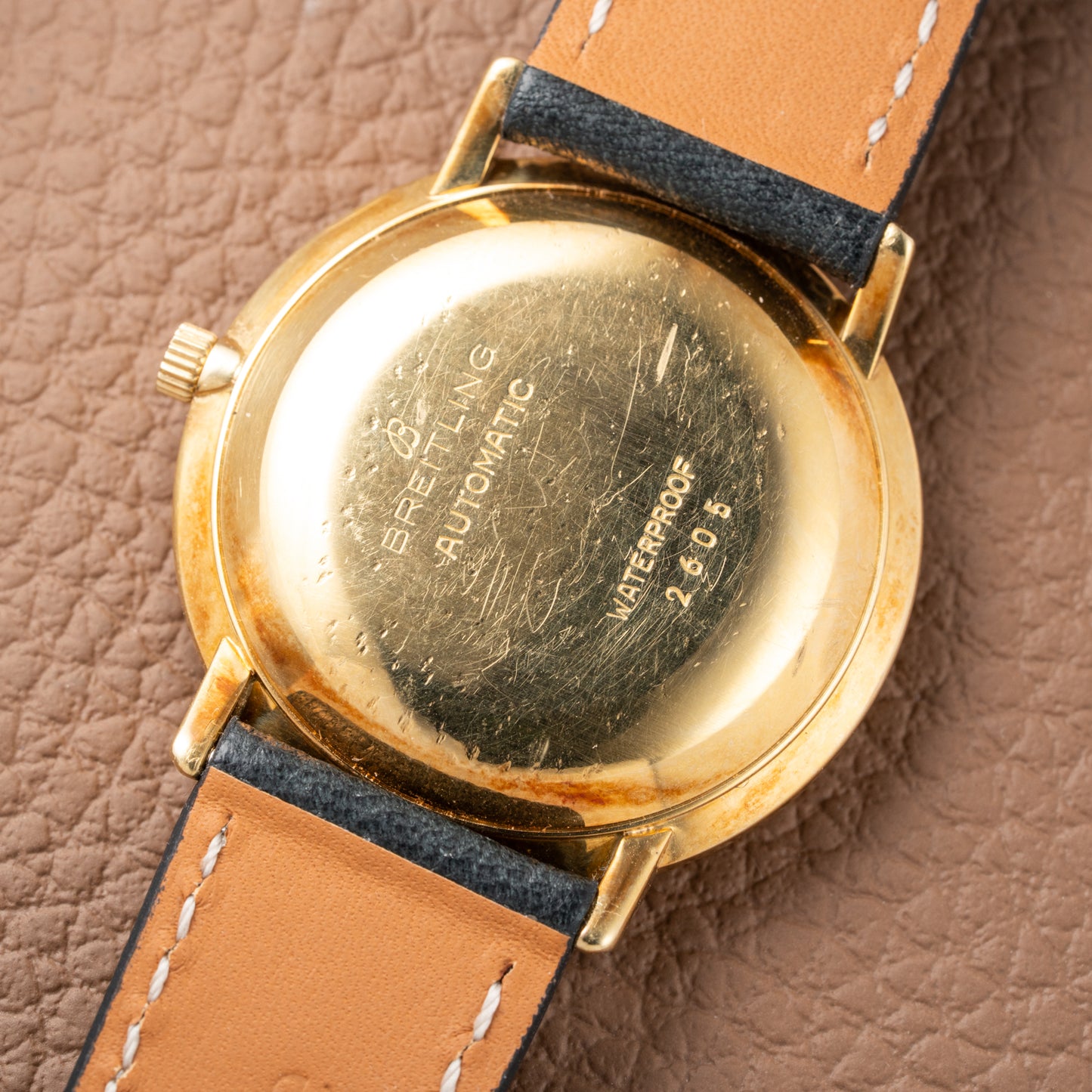Breitling Genève Automatic Date Dress Watch Rare ‘String’ Textured Sunburst Dial 18K Yellow Gold Ref. 2605 from 1960s