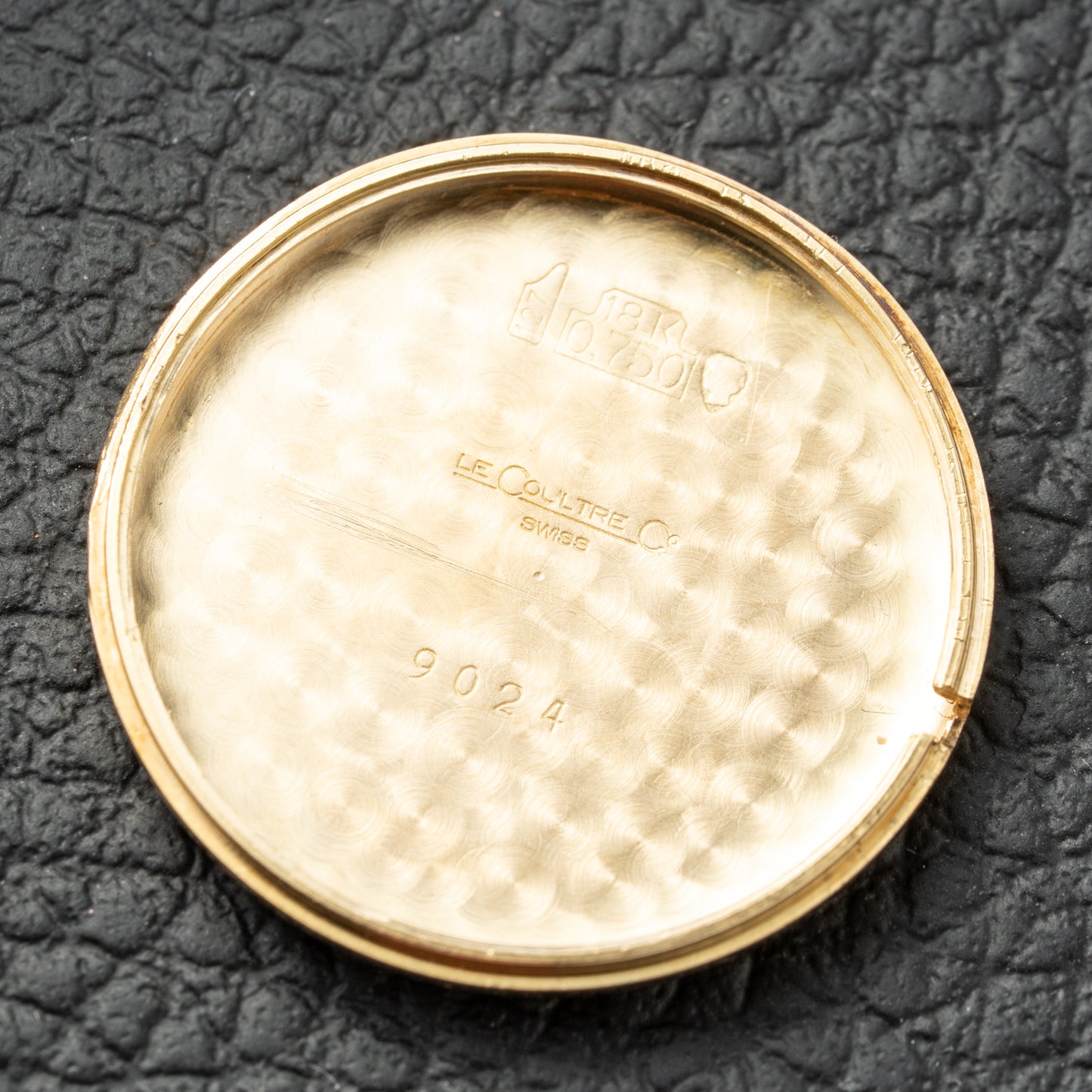Jaeger LeCoultre Hand Engraved 18K Yellow Gold Oval Roman Dial (1960s) Calibre 818