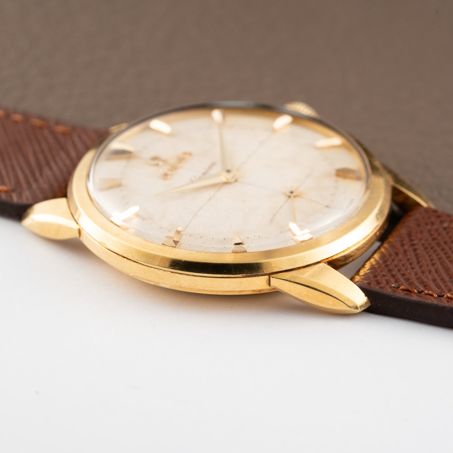 Omega Genève Honeycomb Oversize 18k Yellow Gold Ref. 2748 from 1954