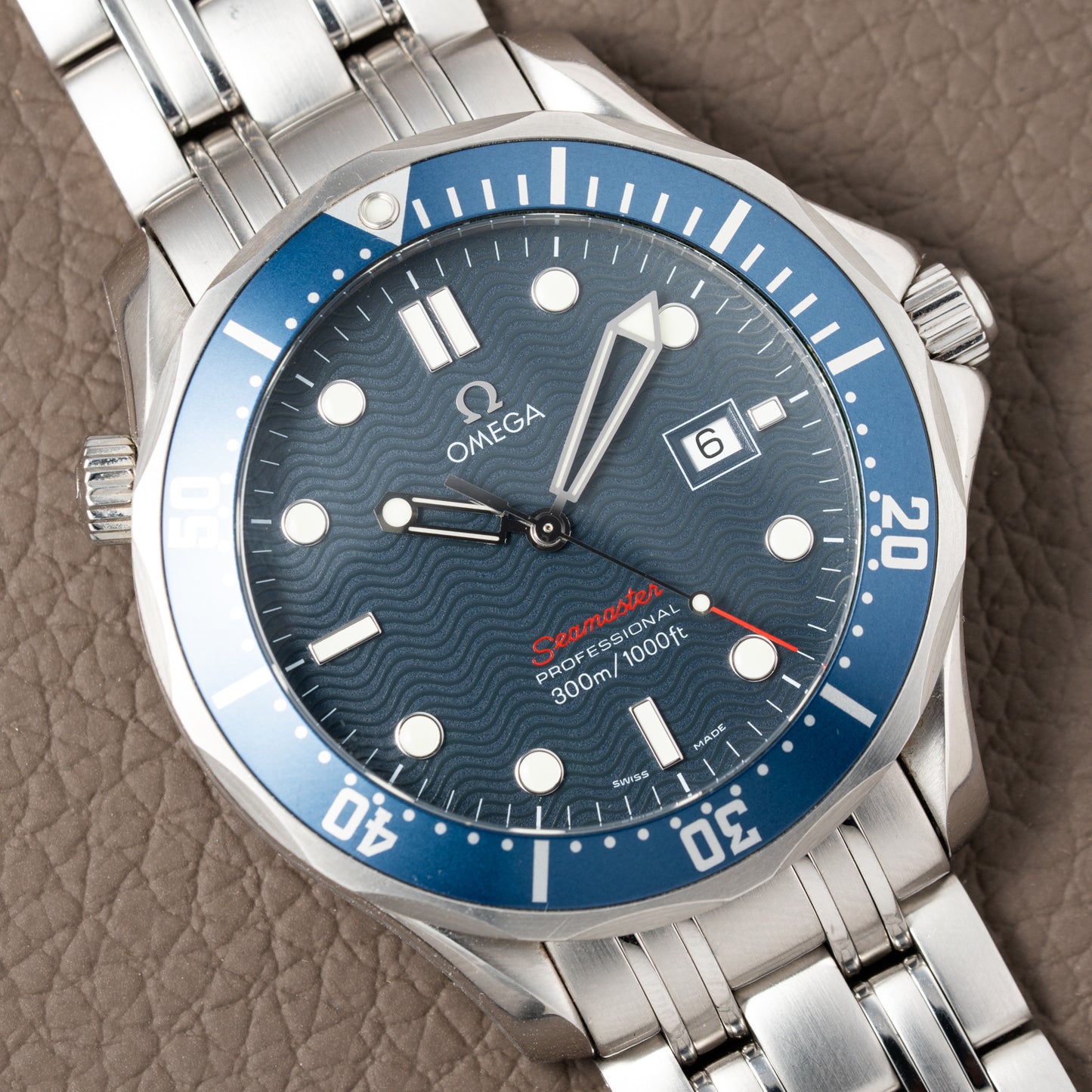 Omega Seamaster Quartz Blue Wave 300M Ref. 22218000 from 2012 with paper