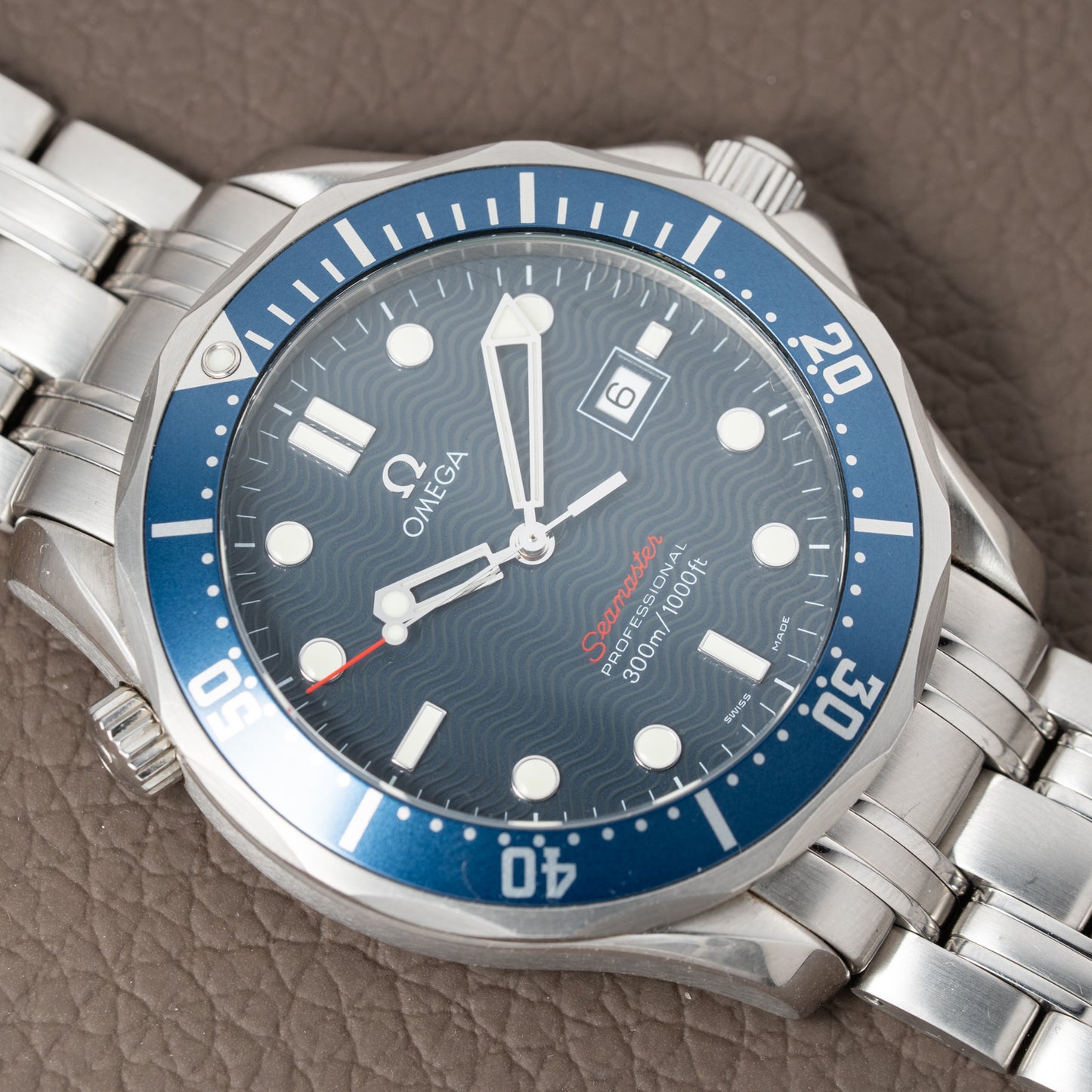 Omega Seamaster Quartz Blue Wave 300M Ref. 22218000 from 2012 with paper