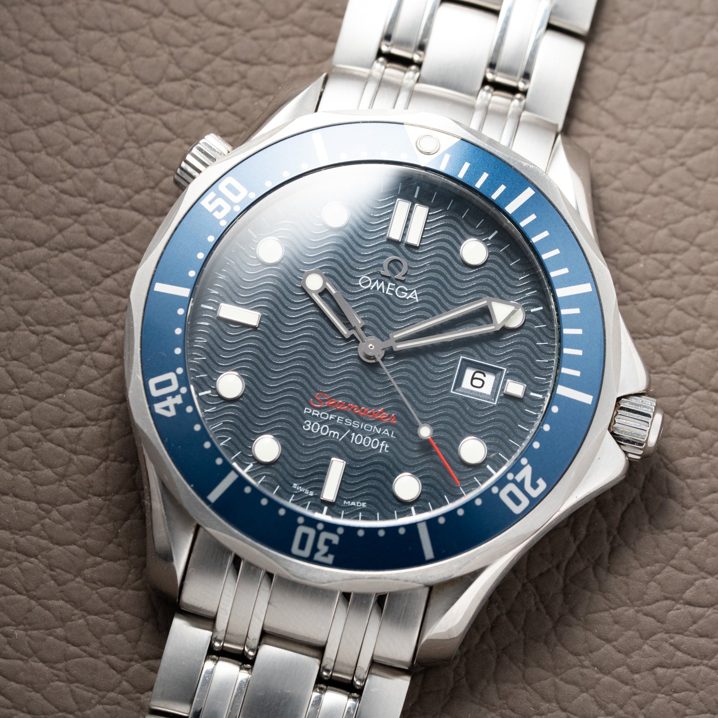 Omega Seamaster Quartz Blue Wave 300M Ref. 22218000 from 2012 with paper