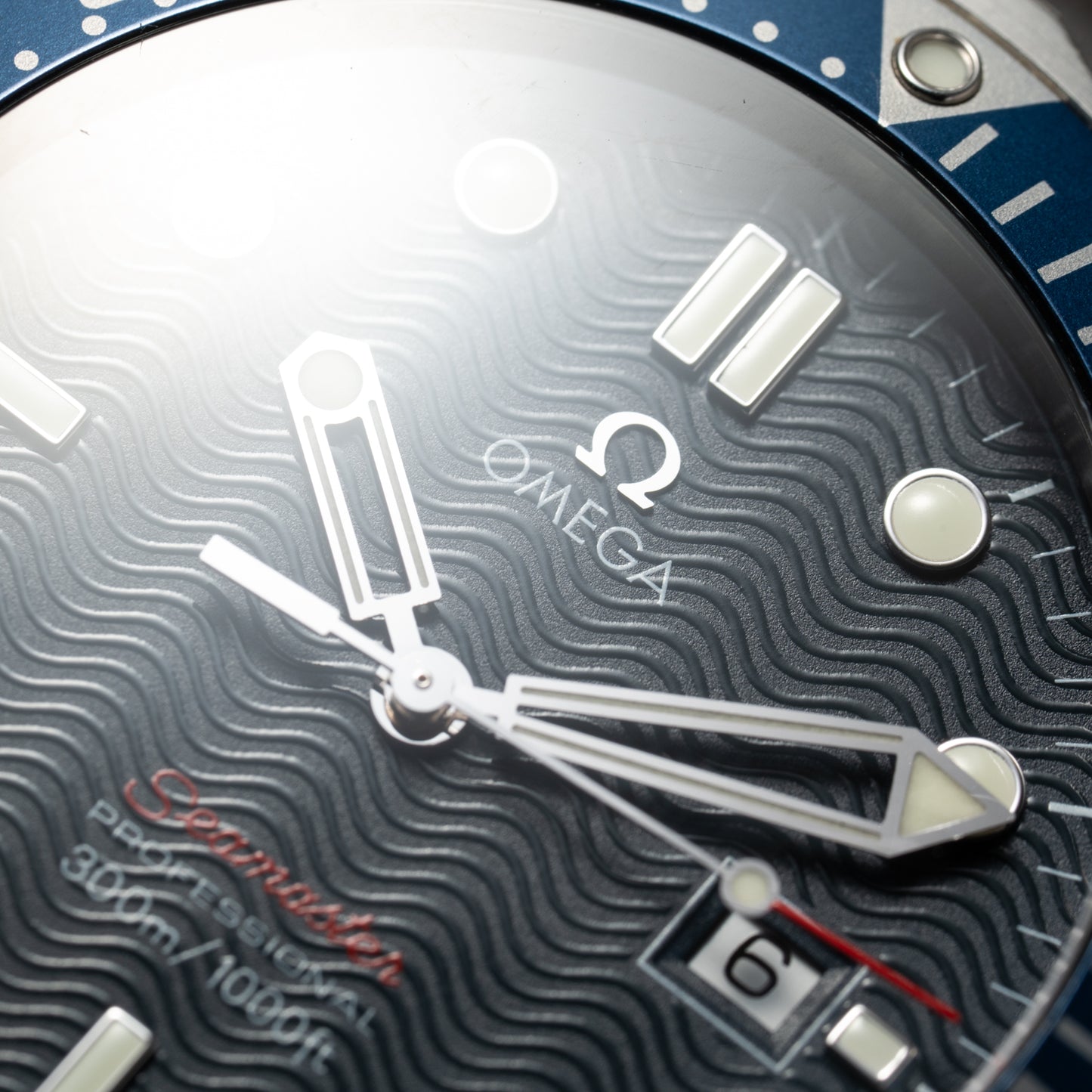 Omega Seamaster Quartz Blue Wave 300M Ref. 22218000 from 2012 with paper