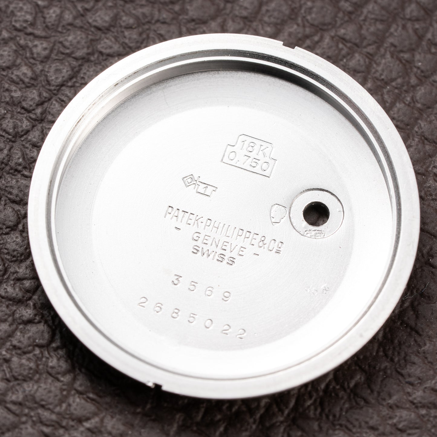 Patek Philippe Automatic Back-Winder Sigma Dial 18K White Gold Bark Finish Ref. 3569 from 1970s