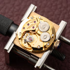 Baume & Mercier Genève Tank Black Roman Numerals 18k Yellow Gold signed by OJ Perrin Paris Ref 38302