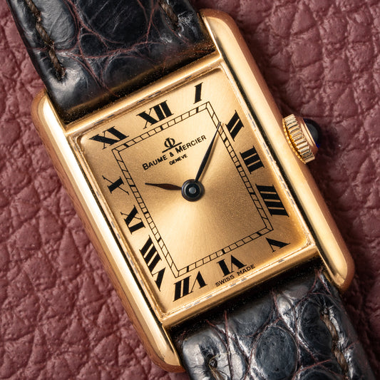 Baume & Mercier Genève Tank Black Roman Numerals 18k Yellow Gold signed by OJ Perrin Paris Ref 38302