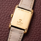 Baume & Mercier Genève Tank Black Roman Numerals 18k Yellow Gold signed by OJ Perrin Paris Ref 38302