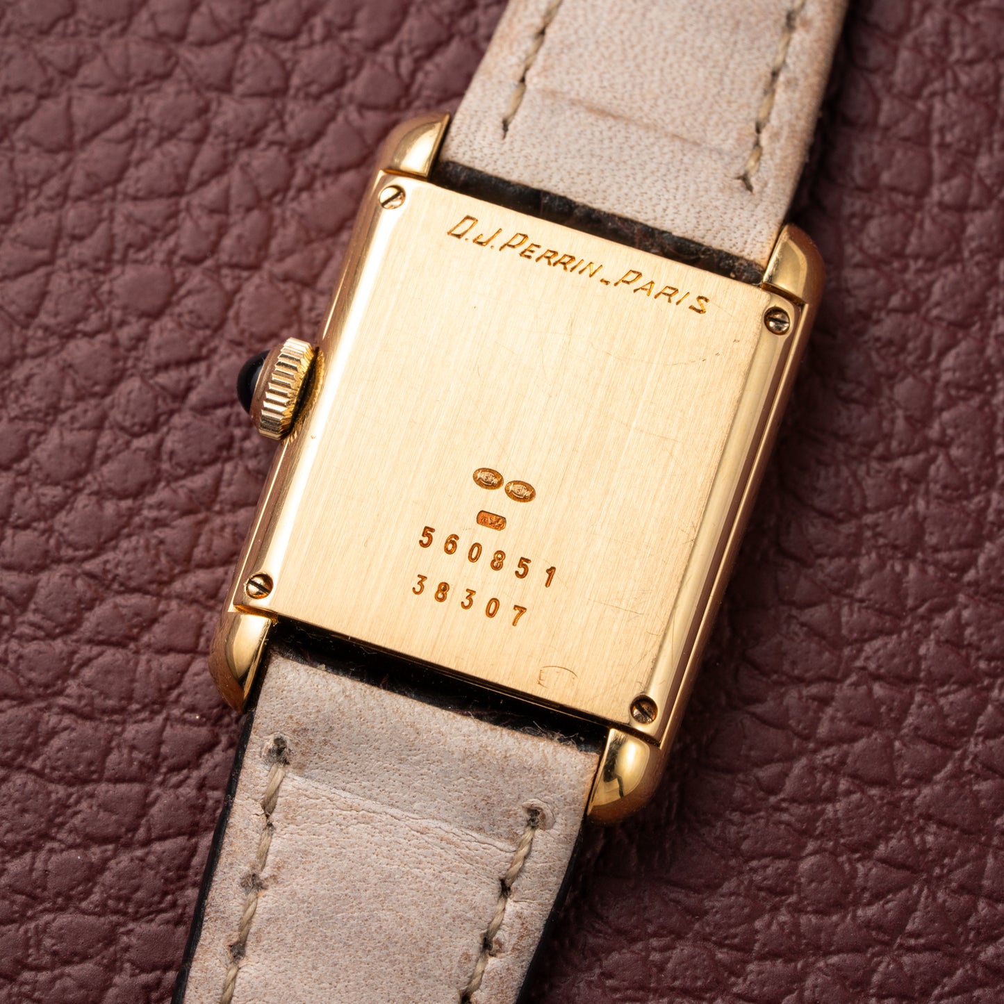 Baume & Mercier Genève Tank Black Roman Numerals 18k Yellow Gold signed by OJ Perrin Paris Ref 38302