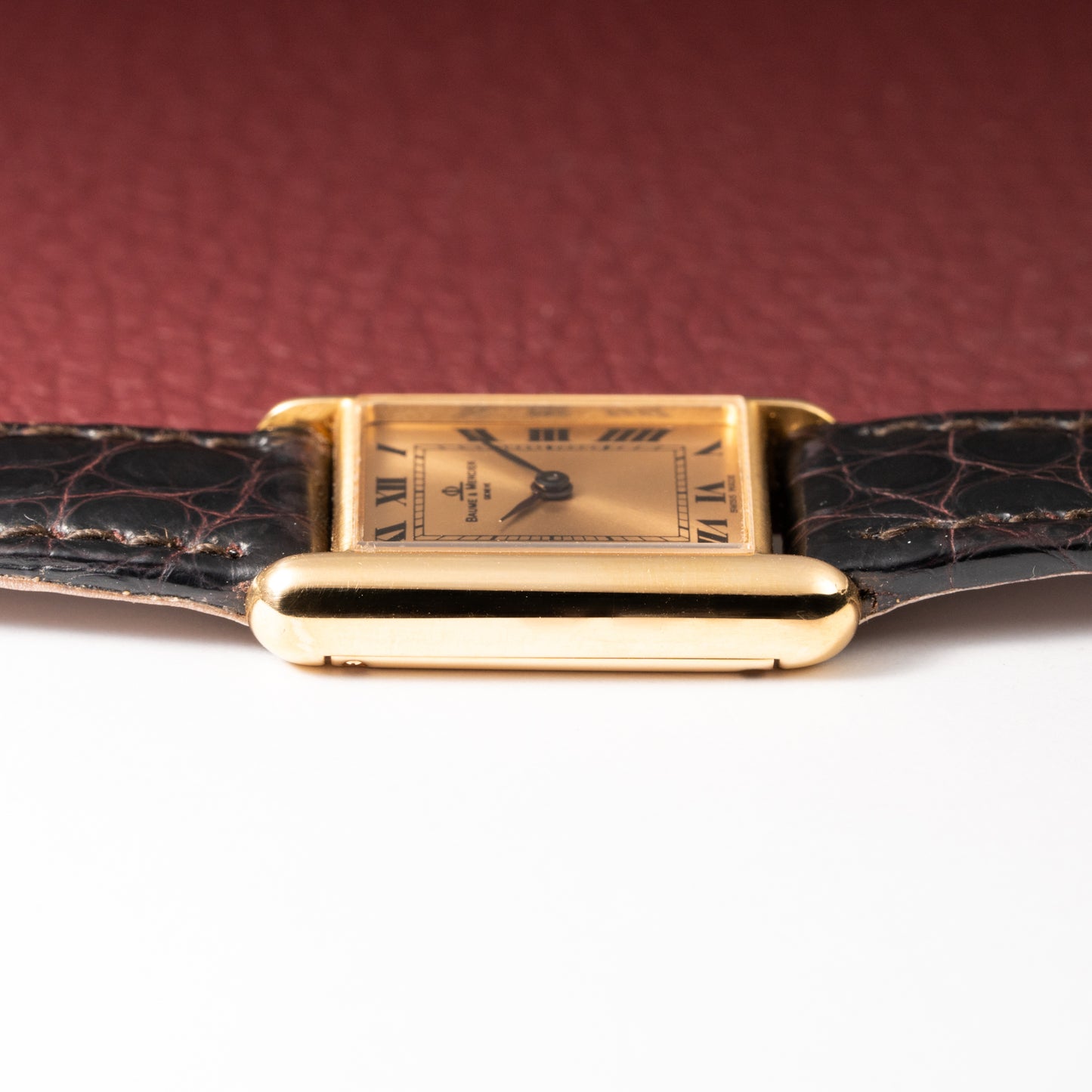 Baume & Mercier Genève Tank Black Roman Numerals 18k Yellow Gold signed by OJ Perrin Paris Ref 38302