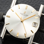 Breitling Genève Automatic Date Dress Watch Rare ‘String’ Textured Sunburst Dial 18K Yellow Gold Ref. 2605 from 1960s