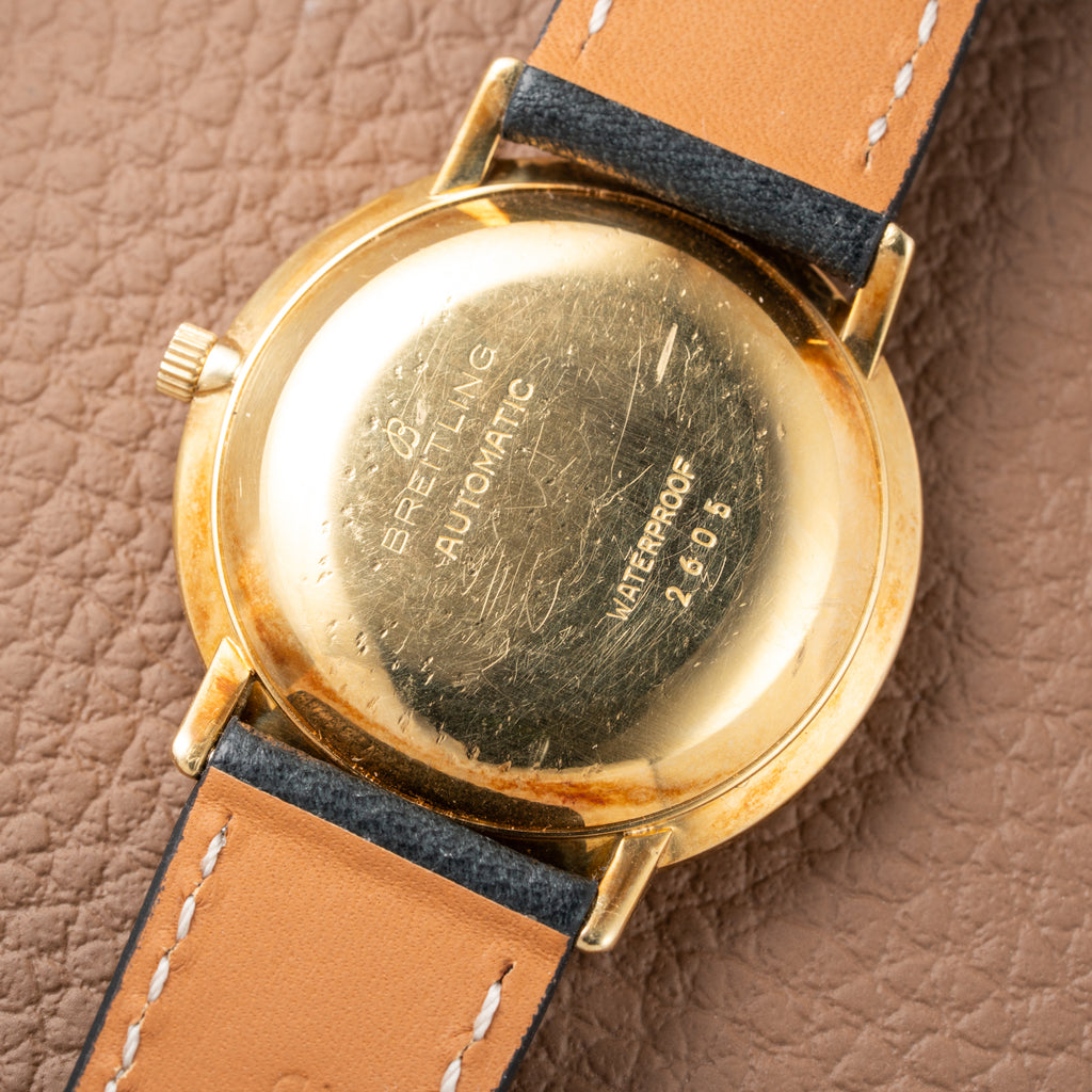 Breitling Genève Automatic Date Dress Watch Rare ‘String’ Textured Sunburst Dial 18K Yellow Gold Ref. 2605 from 1960s
