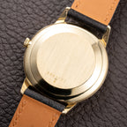 Jaeger-LeCoultre Ultra-Thin Dress Watch 18K Yellow Gold Linnen Dial with Date Ref. 21002 from 1960s