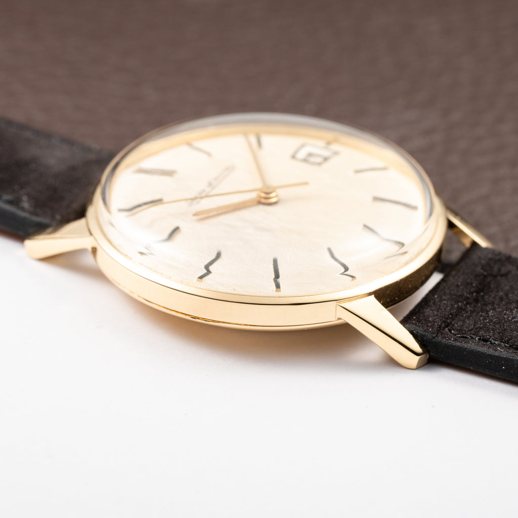 Jaeger-LeCoultre Ultra-Thin Dress Watch 18K Yellow Gold Linnen Dial with Date Ref. 21002 from 1960s