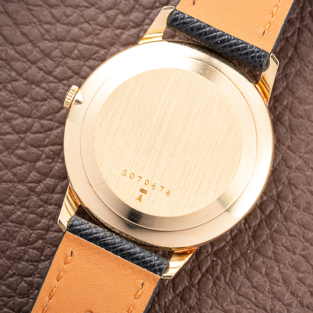 Jaeger-LeCoultre Ultra-Thin Dress Watch 18K Yellow Gold Linnen Dial with Date Ref. 21002 from 1960s