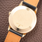 Jaeger-LeCoultre Ultra-Thin Dress Watch 18K Yellow Gold Linnen Dial with Date Ref. 21002 from 1960s