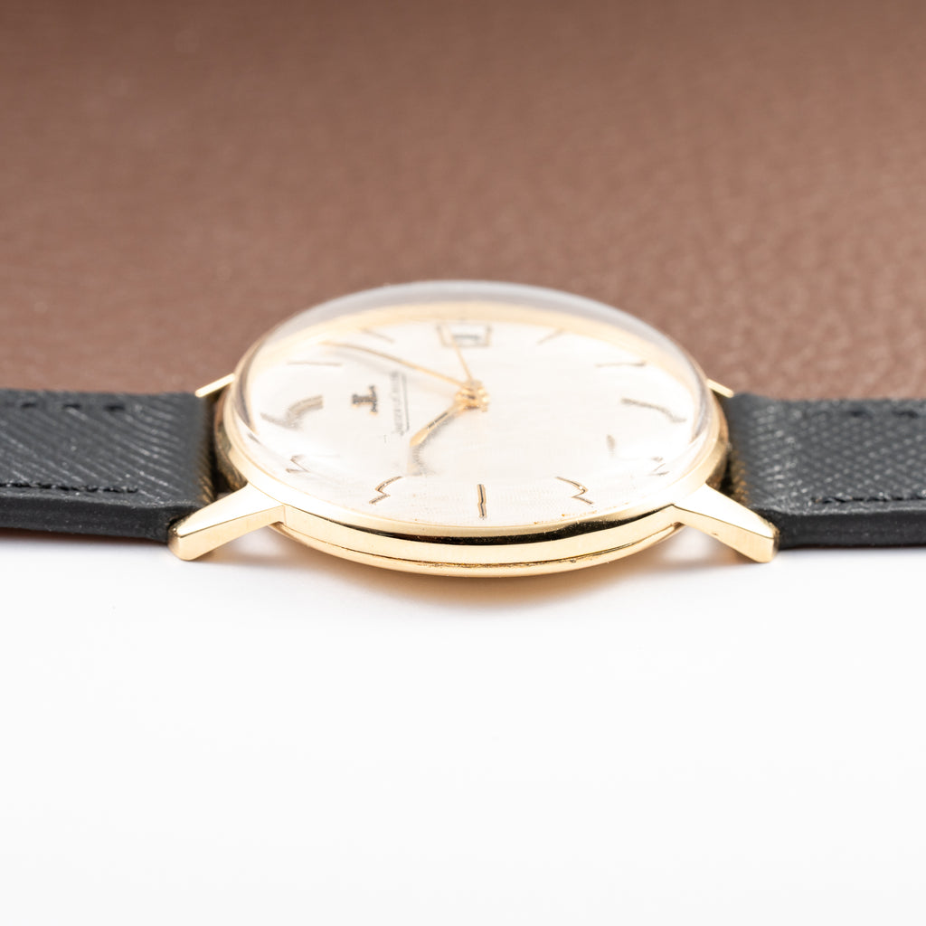 Jaeger-LeCoultre Ultra-Thin Dress Watch 18K Yellow Gold Linnen Dial with Date Ref. 21002 from 1960s