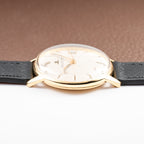 Jaeger-LeCoultre Ultra-Thin Dress Watch 18K Yellow Gold Linnen Dial with Date Ref. 21002 from 1960s