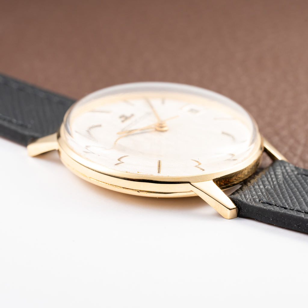 Jaeger-LeCoultre Ultra-Thin Dress Watch 18K Yellow Gold Linnen Dial with Date Ref. 21002 from 1960s