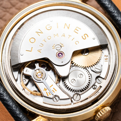 Longines Automatic Date 12 Ref. 7008 18k Yellow Gold from 1961