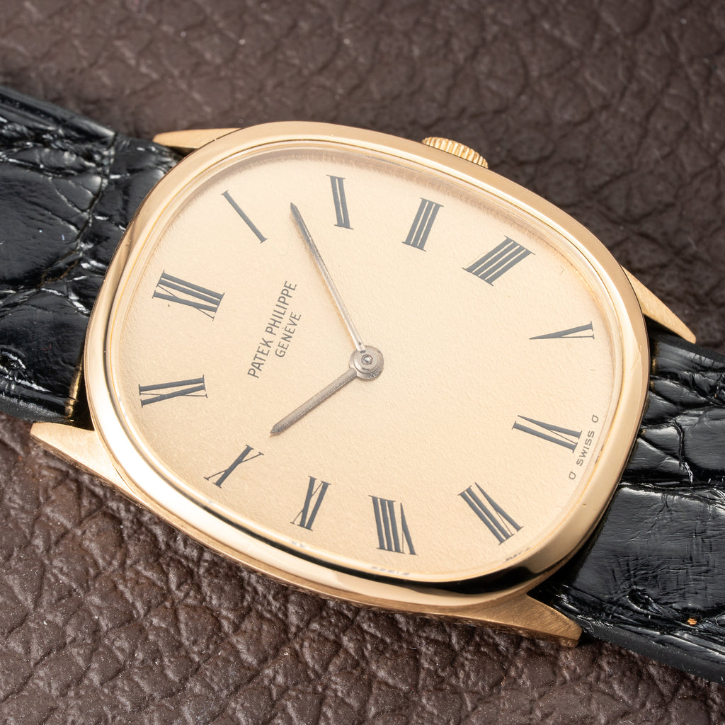 Patek Philippe Ellipse Champagne Textured Roman Dial 18K Yellow Gold Ref 3546 from 1970s