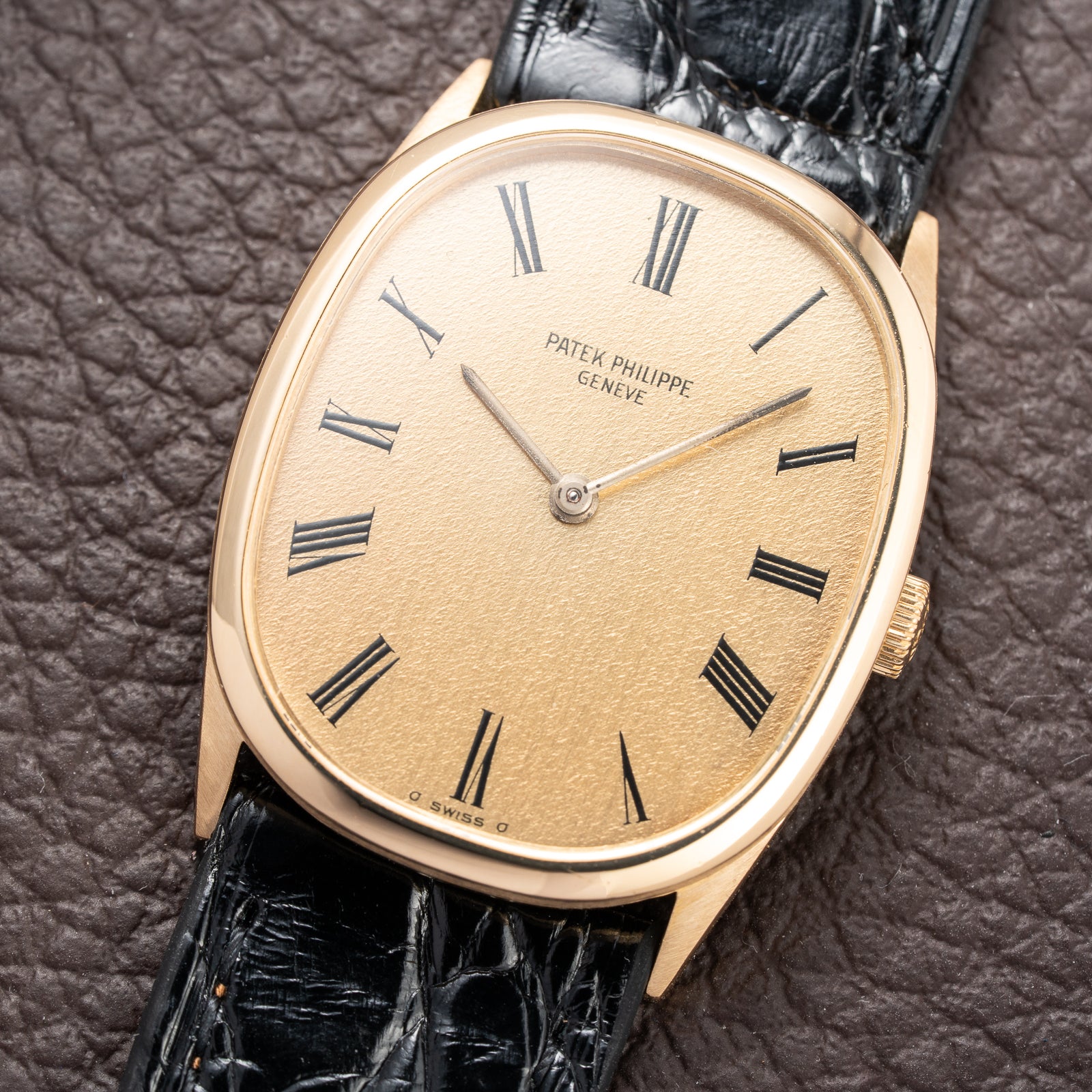 Patek Philippe Ellipse Champagne Textured Roman Dial 18K Yellow Gold Ref 3546 from 1970s