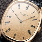 Patek Philippe Ellipse Champagne Textured Roman Dial 18K Yellow Gold Ref 3546 from 1970s