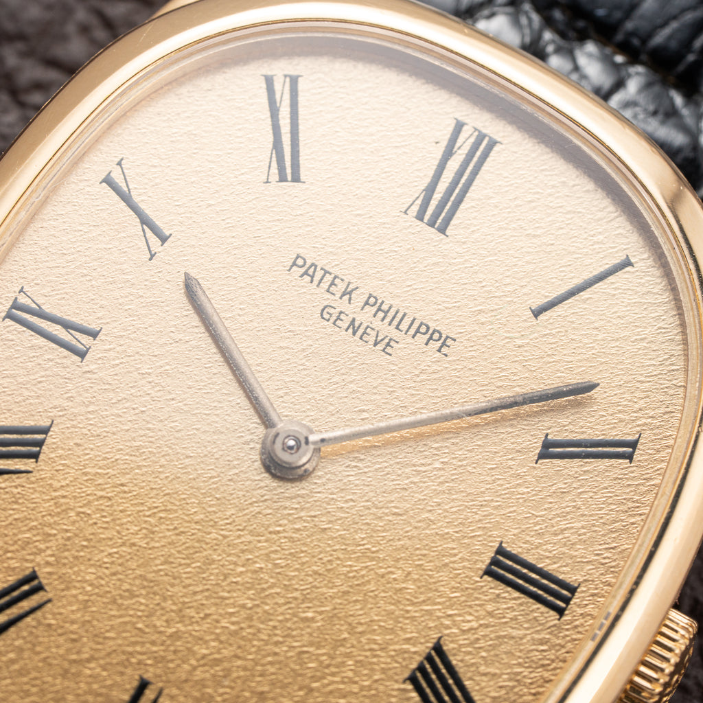 Patek Philippe Ellipse Champagne Textured Roman Dial 18K Yellow Gold Ref 3546 from 1970s