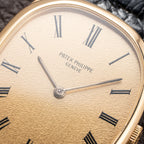 Patek Philippe Ellipse Champagne Textured Roman Dial 18K Yellow Gold Ref 3546 from 1970s
