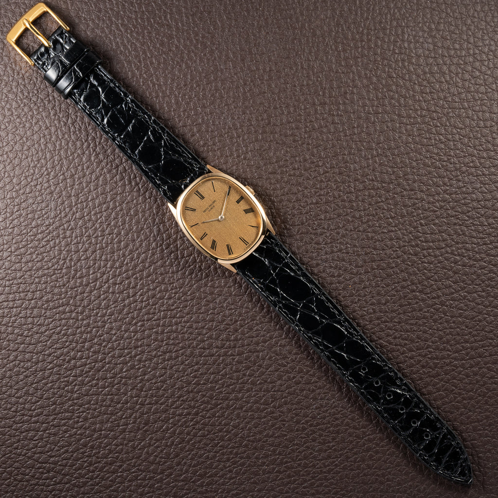 Patek Philippe Ellipse Champagne Textured Roman Dial 18K Yellow Gold Ref 3546 from 1970s
