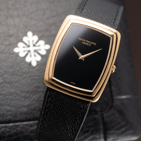 Patek Philippe Ellipse Onyx Black Dial 18k Yellow Gold Ref. 3632 from 1980s