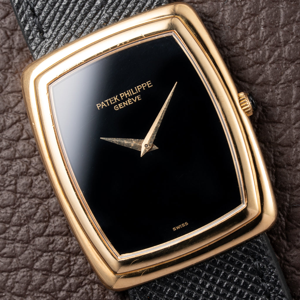Patek Philippe Ellipse Onyx Black Dial 18k Yellow Gold Ref. 3632 from 1980s
