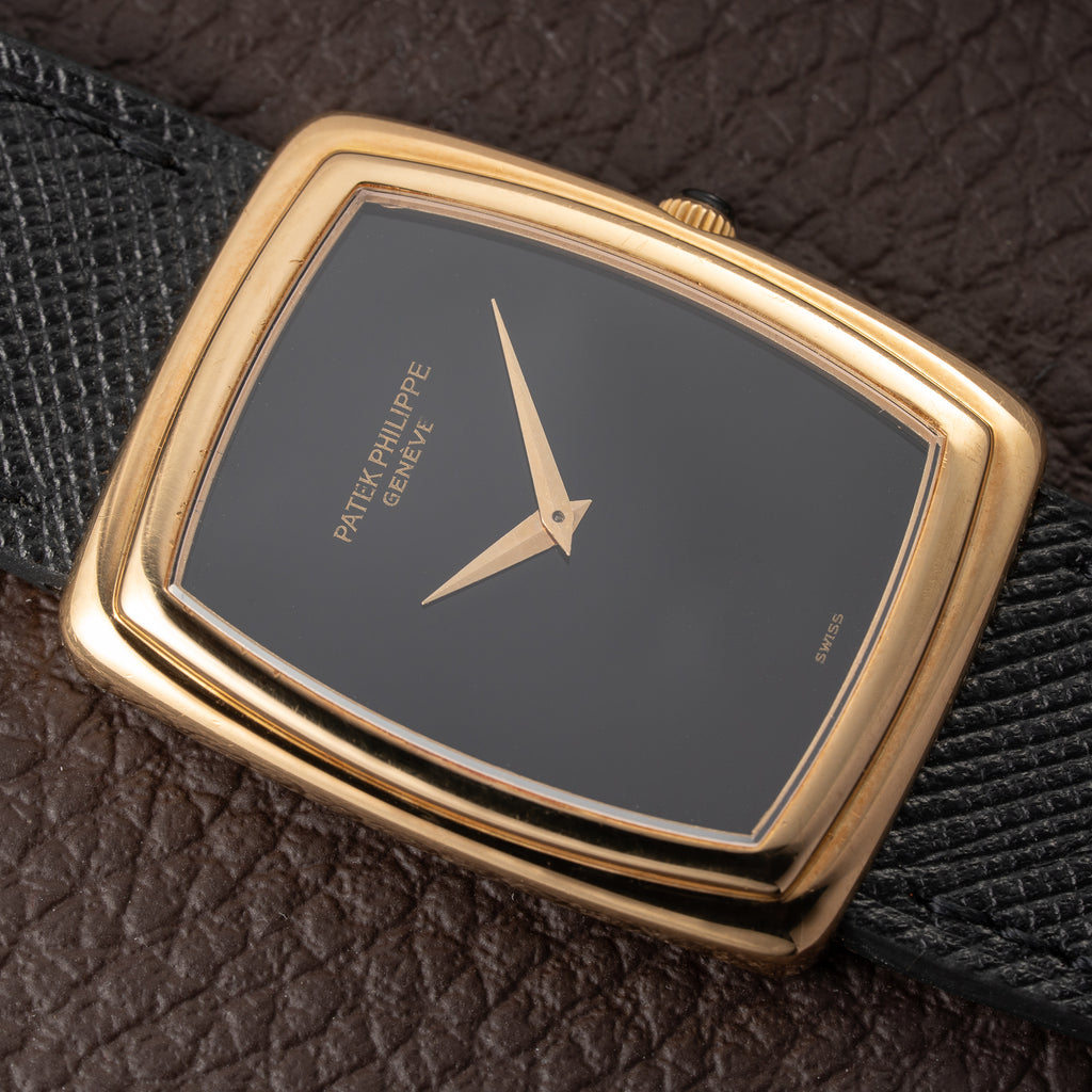 Patek Philippe Ellipse Onyx Black Dial 18k Yellow Gold Ref. 3632 from 1980s