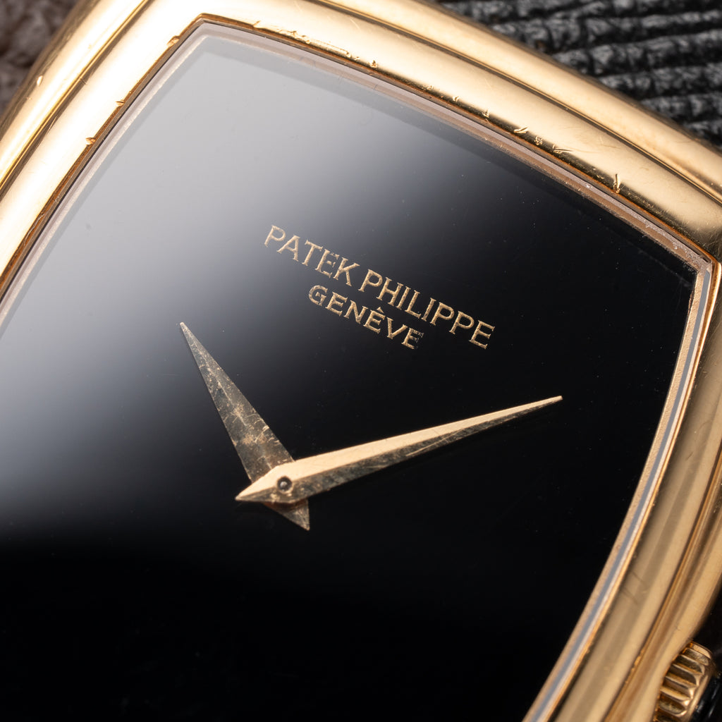 Patek Philippe Ellipse Onyx Black Dial 18k Yellow Gold Ref. 3632 from 1980s