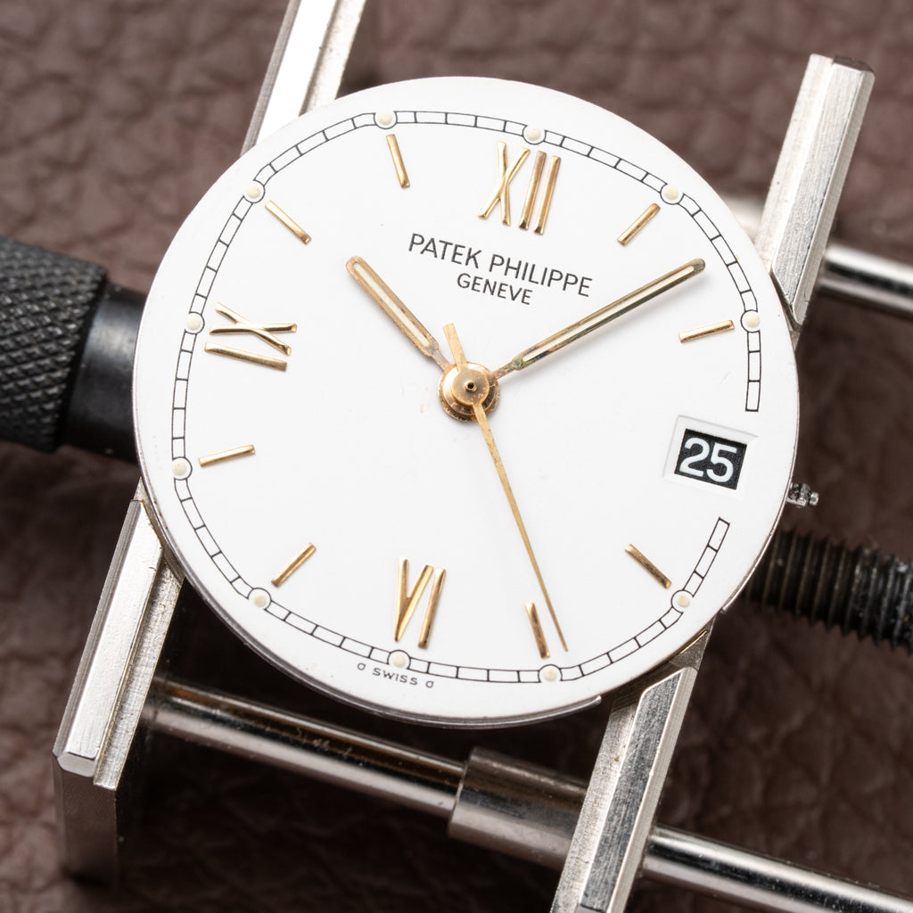 Patek Philippe Nautilus Gold/Steel White Cream Ceramic Sigma Dial Ref 3800 from 1980s