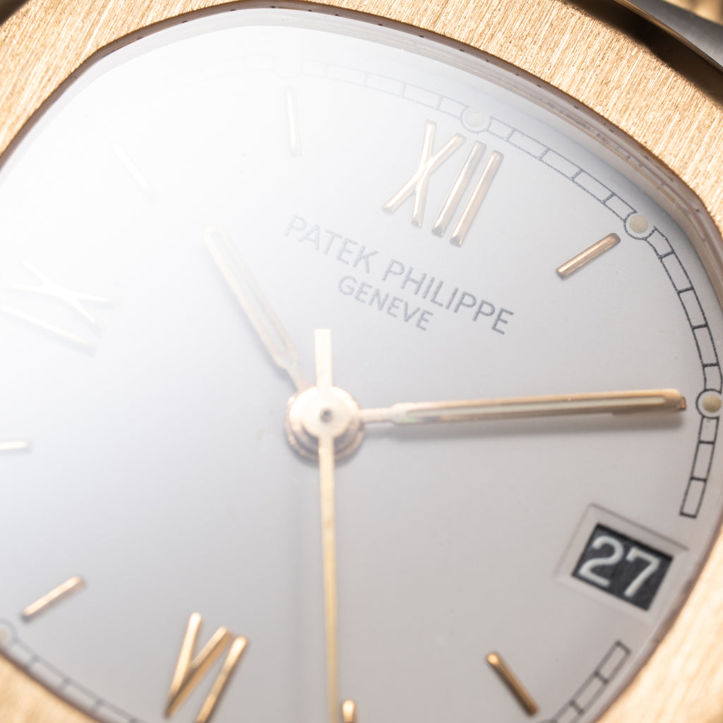 Patek Philippe Nautilus Gold/Steel White Cream Ceramic Sigma Dial Ref 3800 from 1980s