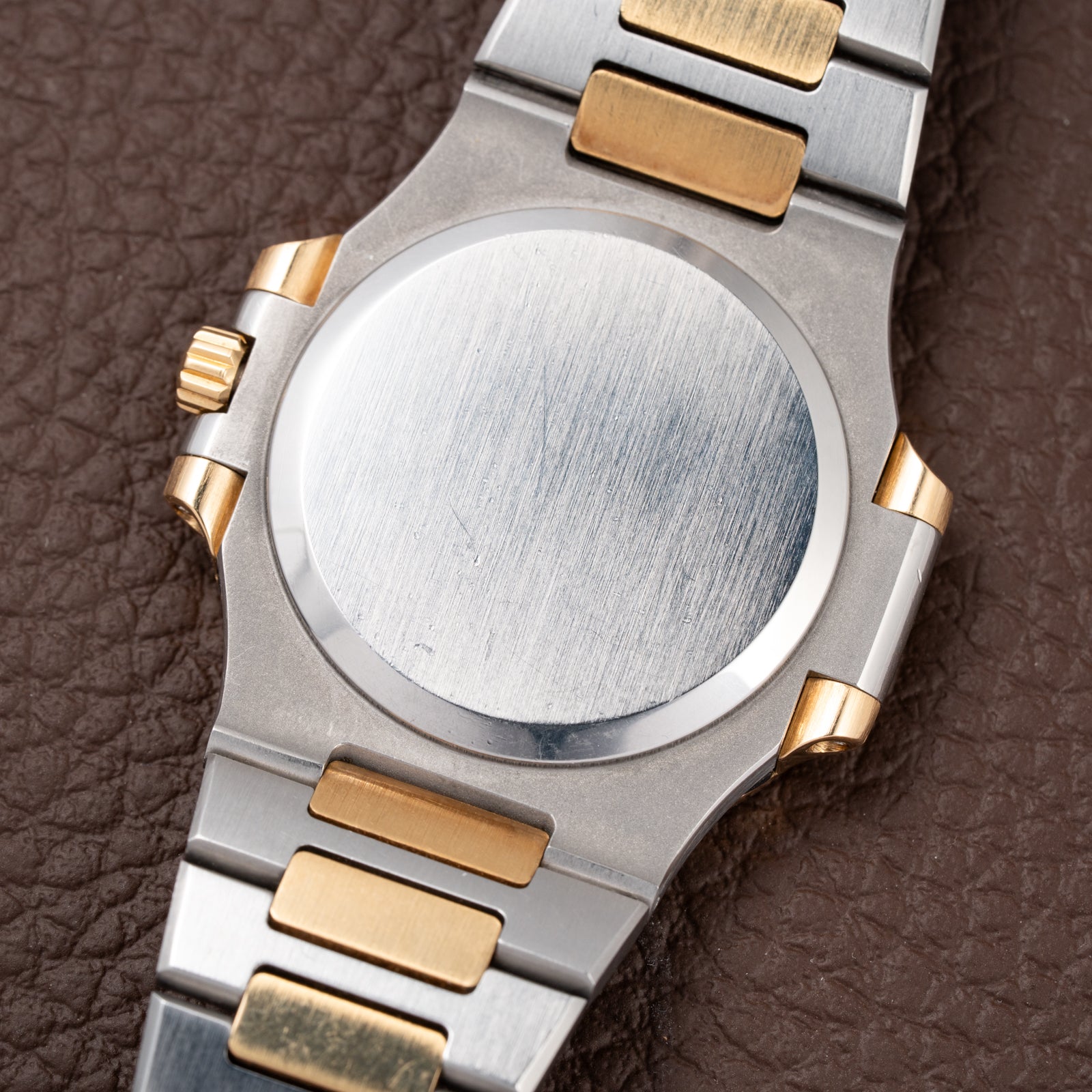 Patek Philippe Nautilus Gold/Steel White Cream Ceramic Sigma Dial Ref 3800 from 1980s