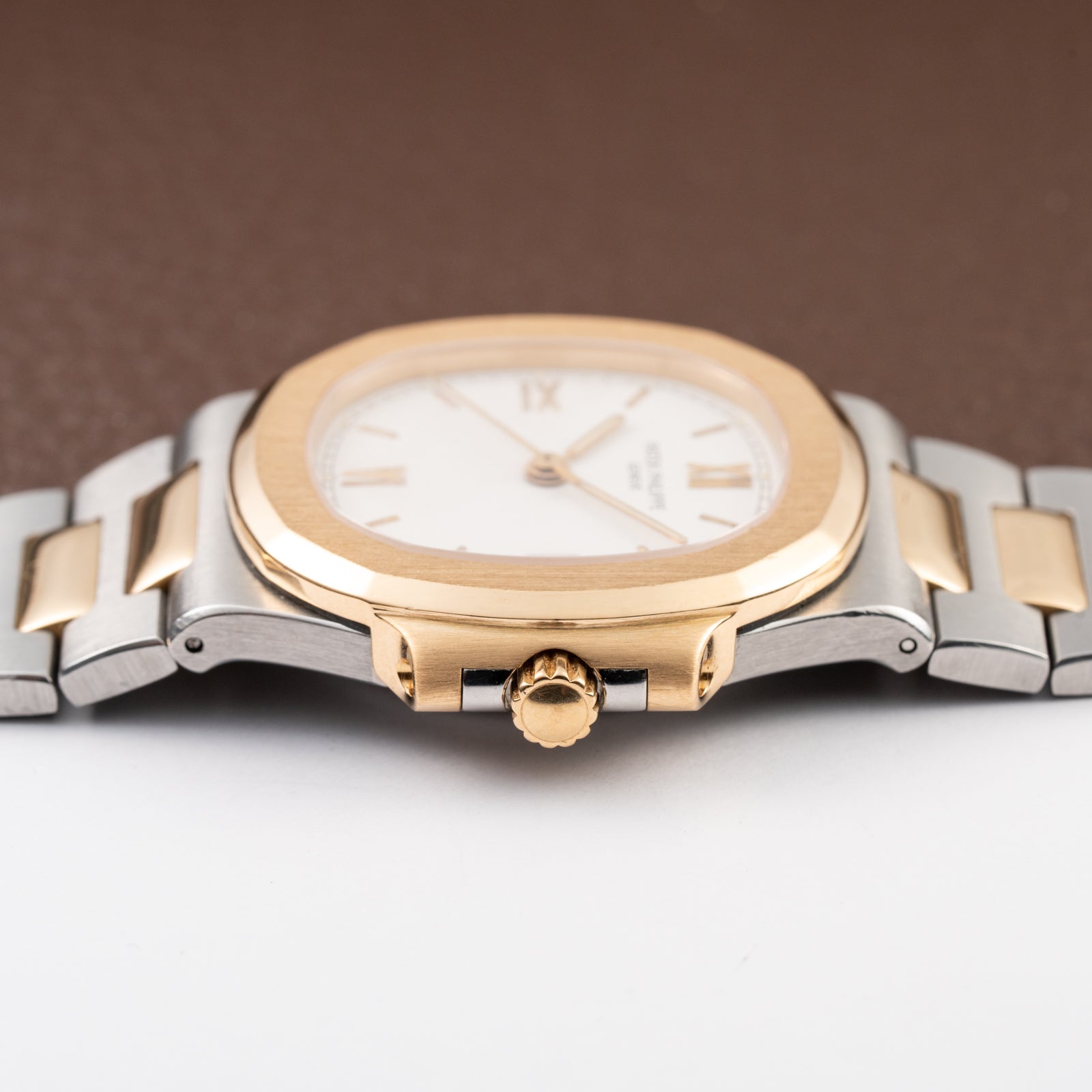 Patek Philippe Nautilus Gold/Steel White Cream Ceramic Sigma Dial Ref 3800 from 1980s
