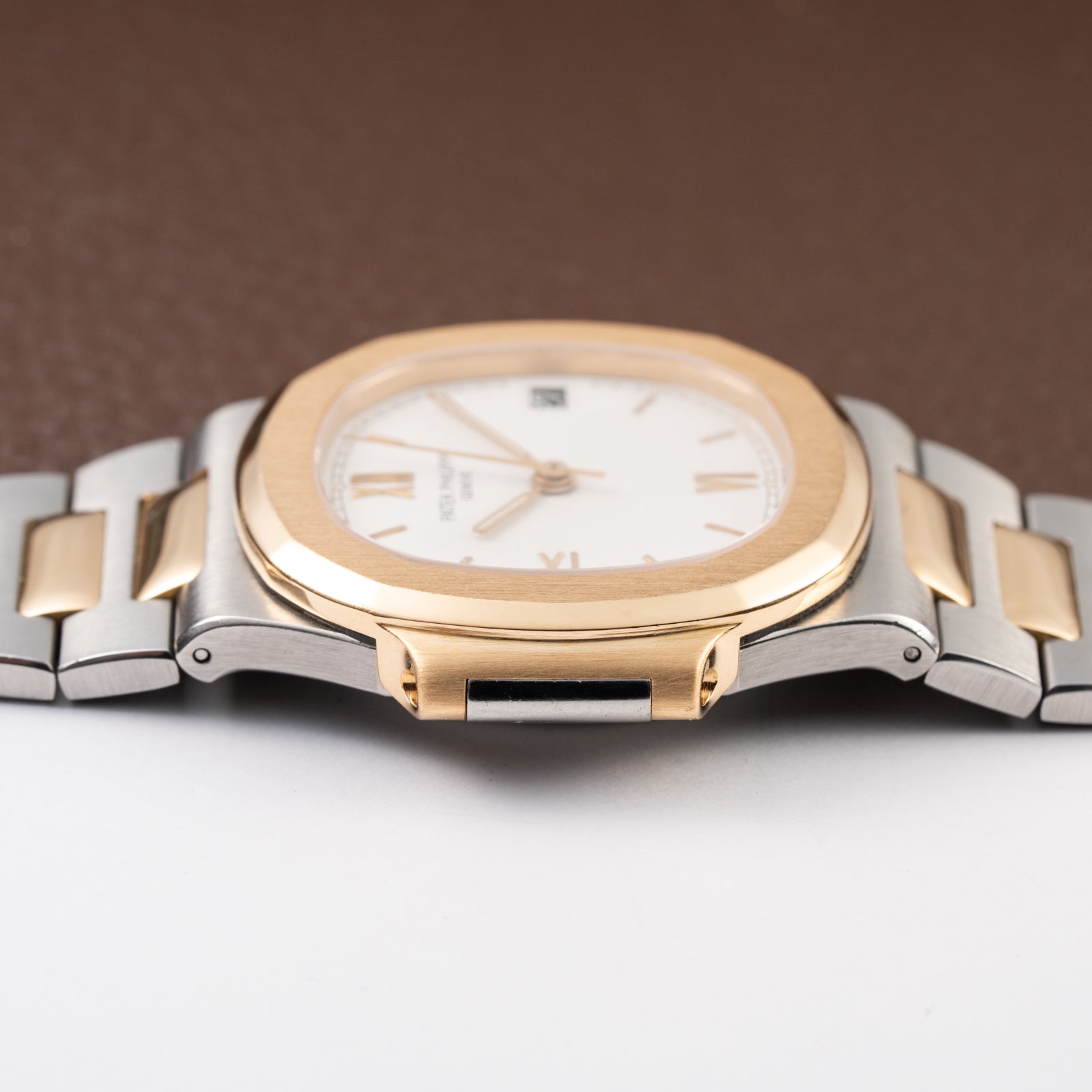 Patek Philippe Nautilus Gold/Steel White Cream Ceramic Sigma Dial Ref 3800 from 1980s