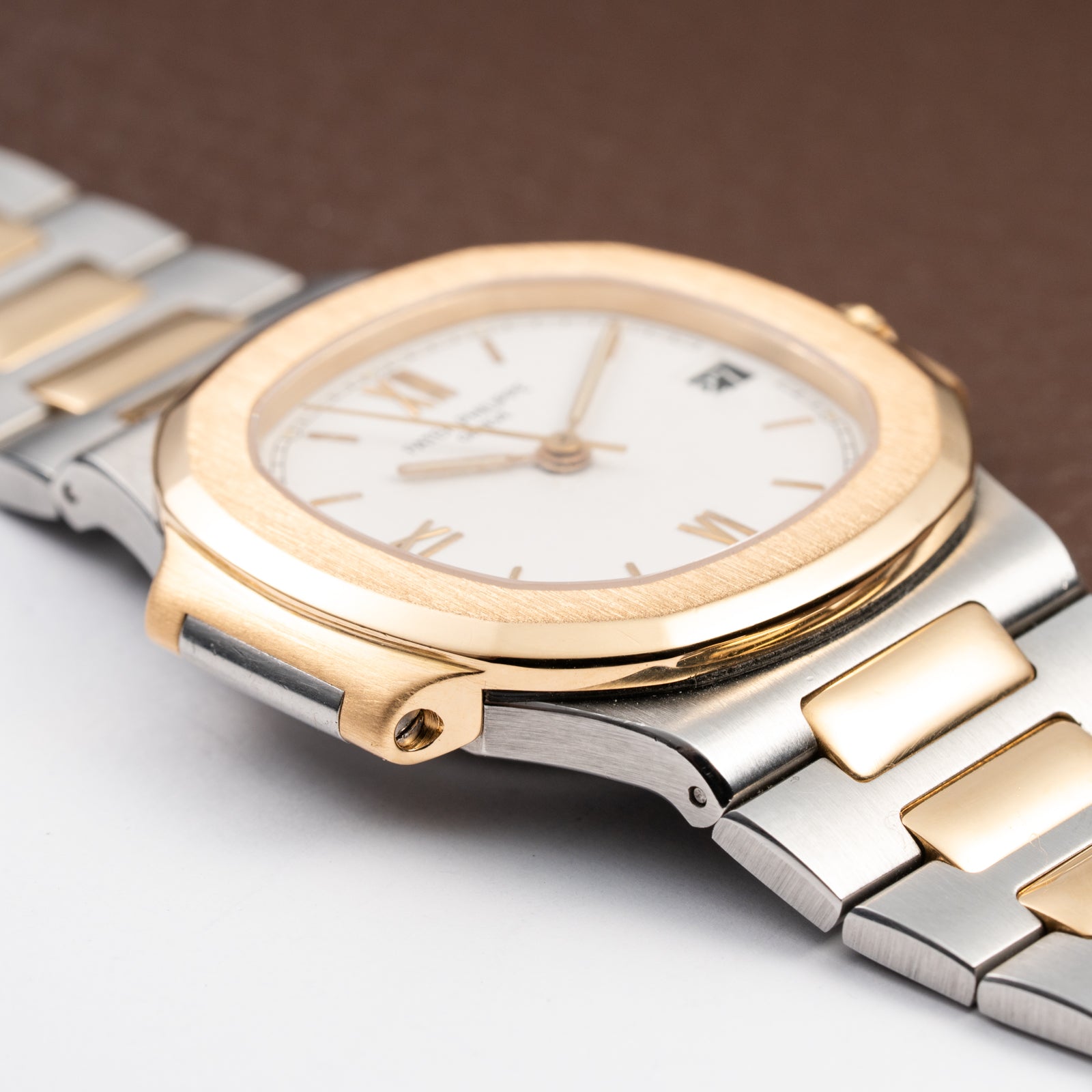 Patek Philippe Nautilus Gold/Steel White Cream Ceramic Sigma Dial Ref 3800 from 1980s