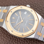 Audemars Piguet Royal Oak Co-Signed Fred Paris Gold Steel Automatic Ref. 4100SA from 1970s