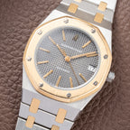 Audemars Piguet Royal Oak Co-Signed Fred Paris Gold Steel Automatic Ref. 4100SA from 1970s